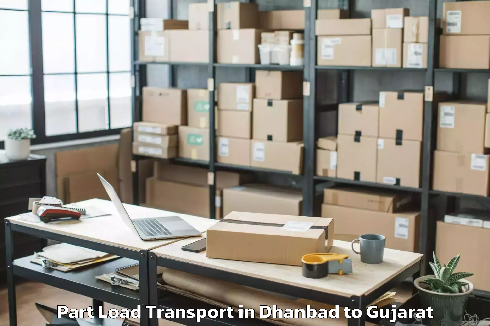 Book Dhanbad to Gussar Part Load Transport